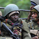Kenyan troops are locked in a firefight with Somalian militants. (Simon Maina/AFP/Getty Images)